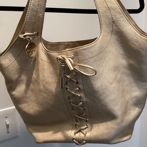 Stuart Weitzman gold handbag